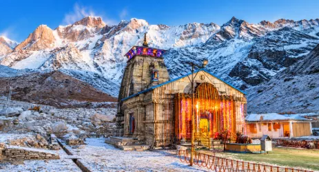 Kedarnath Temple surrounded by snow-covered Himalay
