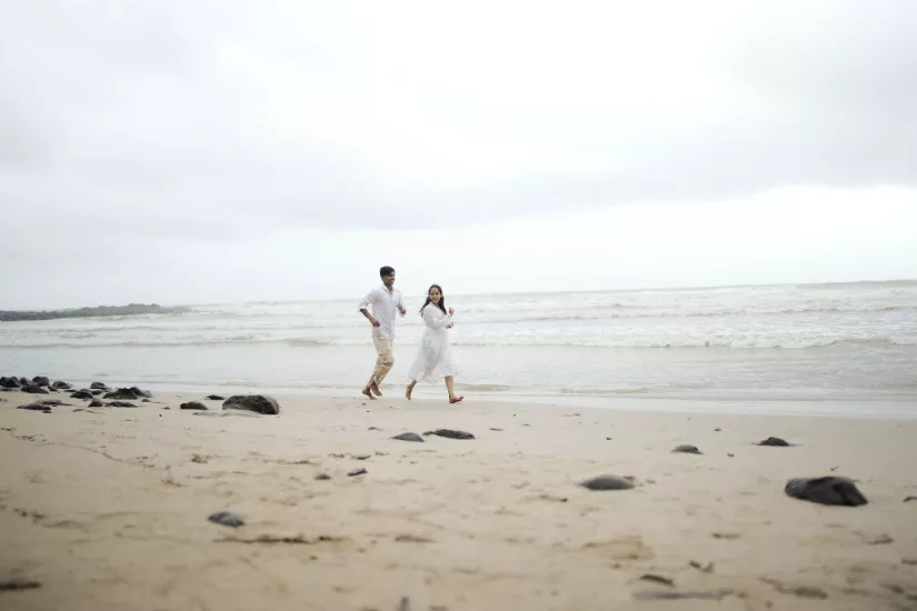 enjoying a romantic walk along a peaceful Goa beach